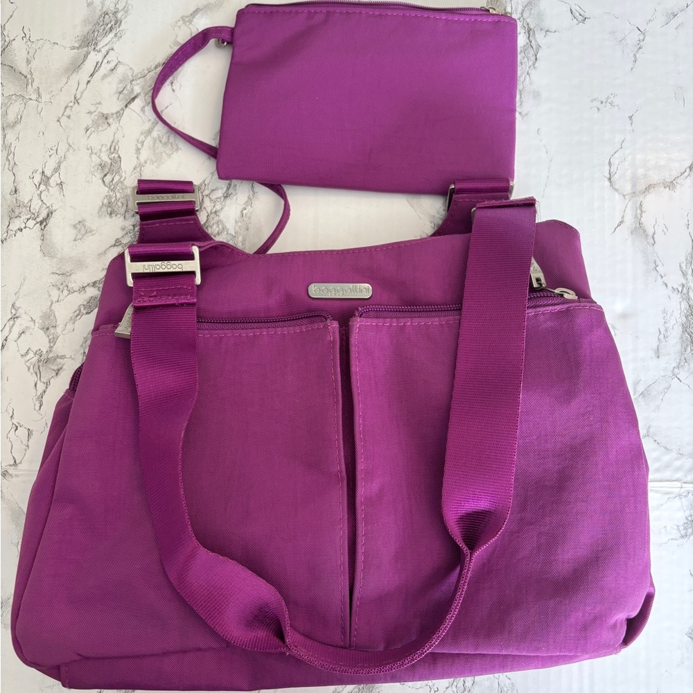Baggallini radiant orchid two-strap shoulder bag with pouch and card slots.